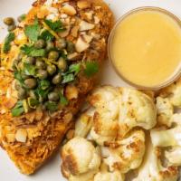 Chicken Piccata · Paleo, whole30, keto, and gluten-free. Keto-friendly “breaded” chicken is topped with our le...