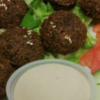 Falafel Plate · Vegetarian, gluten-free. Deep-fried ground garbanzo bean. Mixed with onions, parsley, and sp...