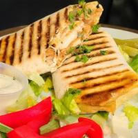 Arabic Style Chicken Shawarma Wrap · Chicken, pickle and garlic sauce grilled in thin flat bread.