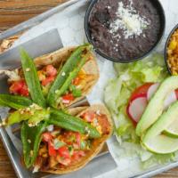 Fish Taco Meal · Two delicious tacos served in corn tortillas. Sprinkled with pico de gallo and a touch of ou...