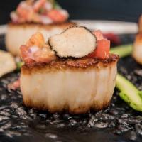 Diver Scallops · Pan seared sea scallops served with parsnip puree