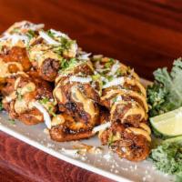 Elote Wings 8 Ct · Our dry rubbed wings, chipotle aoili, cotija cheese, cilantro, and lime served with carrots ...