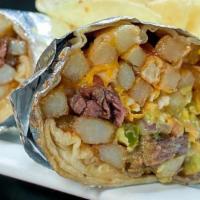 Cali Burrito · Marinated steak, french fries, salsa, guacamole, and cheddar jack cheese, rolled in a flour ...