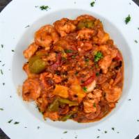 Jambalaya · Chicken, shrimp, andouille sausage, tomatoes, onion, and roasted red peppers.