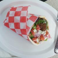 Falafel Gyro Style · Golden falafel boils, lettuce, tomatoes, onions and our tzatziki sauce.