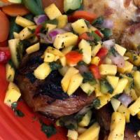 Pork Chops (Mango Salsa) · Pork chops fresh mangoes, cilantro, red and green bell peppers, jalapeños and red onion.