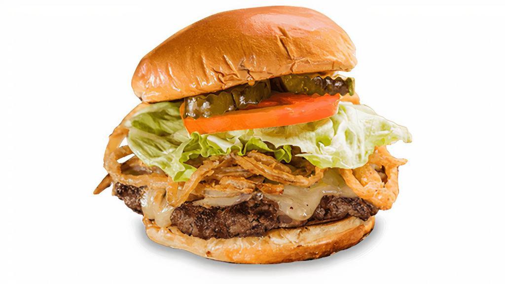 Jacked-N-Stacked Burger* · Topped with Monterey Jack cheese and stacked with crispy Onion Strings, lettuce and tomato. Served with choice of one side and spicy Hell-Fire Pickles.
