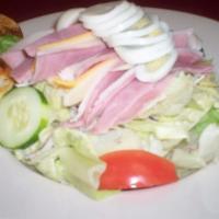 Chef Salad · Mixed greens topped with ham, turkey, American and swiss cheese, boiled egg, tomatoes, and c...