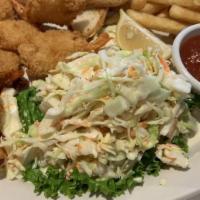 Shrimp Basket · Fried shrimp served with french fries, homemade coleslaw and cocktail sauce.