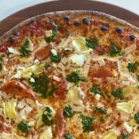 Chicken Pizza · Mozzarella, all-natural chicken, artichokes, house roasted tomatoes, housemade pesto (16-inc...