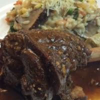 Lamb Shank Risotto · Red wine-roots veget. Braised. Vegetables risotto. Garlic-rosemary jus.