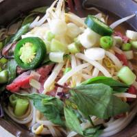 Vegetable Pho · A fresh piping hot bowl of pho with steamed tofu, Napa cabbage, bok choy and carrot, served ...