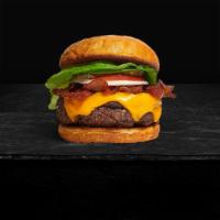 Bacon Burger · American beef patty topped with melted cheese, layers of crispy bacon, lettuce, tomato, and ...