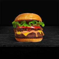 Classic Burger · American beef patty (1/3 lb.)  topped with lettuce, tomato, and pickles.