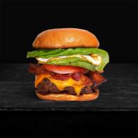 Bacon & Egg Burger · American beef patty topped with bacon, fried egg, avocado, melted cheese, lettuce, tomato, a...