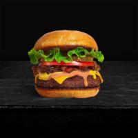 House Burger · American beef patty (1/2 lb.) topped with lettuce, tomato and pickles.