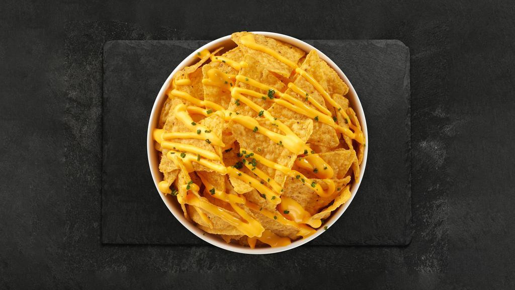 Cheese Nachos · (Vegetarian) Salted tortilla chips doused in melted nacho cheese.