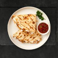 Chicken Quesadilla · Chicken, green peppers, and onions wrapped with cheddar cheese in a grilled tortilla. Served...