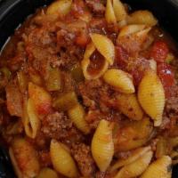 American Chop Suey · Groung Beef, Green Peppers, Onions, Pasta, Grated Cheese, Tomato Sauce