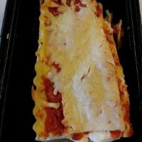 Lasagna · Layers Of Ground Beef, Ricotta Cheese, Mozzarella Cheese, Tomato sauce