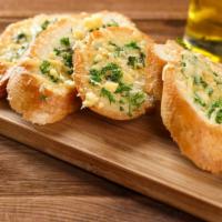 Garlic Herb Cheesy Bread · Perfectly prepared cheesy garlic herb bread made with organic flour, fresh garlic, parsley a...