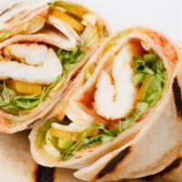 Surf 'N' Turf Wrap · Perfectly prepared wrap with spicy tartar, marinated grilled chicken & shrimp, Cajun rice, r...