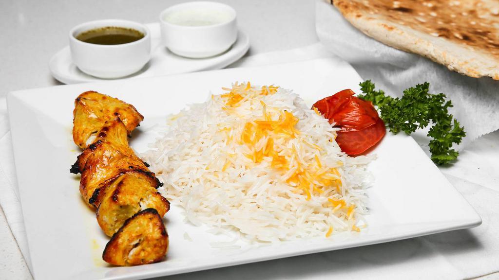 Chicken Kabob · Tender chunks of special recipe boneless chicken breast, served with basmati rice (chalow).