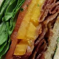 Blt · Bacon, romaine, tomatoes and mayonnaise served on white or wheat toast.