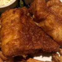 Fish And Chips · A fresh cod filet beer battered and fried to a golden brown; served with a side of french fr...