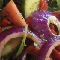 Tomato Cucumber Salad · Gluten free. A wonderful medley of tomatoes, cucumbers, roasted red peppers and red onion to...