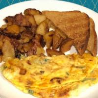 Spanish Omelette · Served with home fries or grits, buttered toast, and jelly.