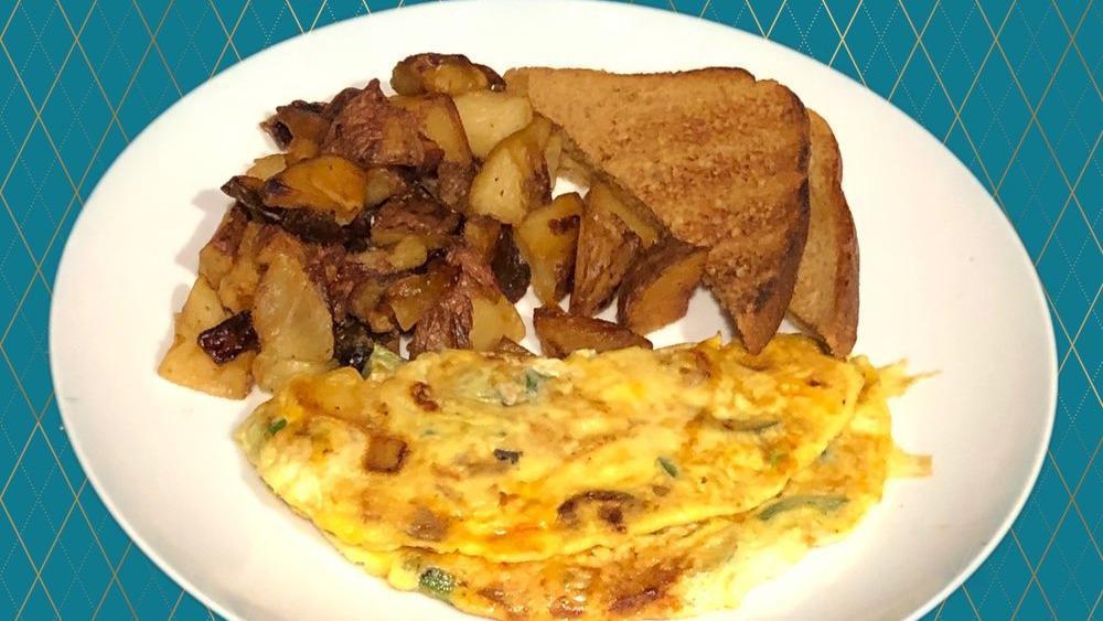 Spanish Omelette · Served with home fries or grits, buttered toast, and jelly.