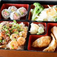 Chicken And Shrimp Bento · Served with mixed vegetable. Four pieces California roll, two pieces chicken dumpling, and t...