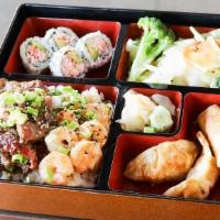 Beef And Shrimp Bento · Served with mixed vegetable. Four pieces California roll, two pieces chicken dumpling, and t...