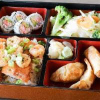 Salmon And Shrimp Bento · Served with mixed vegetables. 4 pcs california rolls, 2 pcs chicken dumplings, and 2 pcs spr...