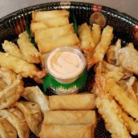 Happy Quickway Fried Plate · 20 pic spring rolls
16 pic chicken dumpling
9 pic  shrimp tempura
2 yammy sauces