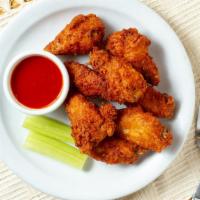 Spicy Wings · Battered chicken wings served with blue cheese