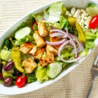Mediterranean Salad · Grilled marinated chicken, red onions, pepperoncini, cucumbers, grape tomato, feta cheese, k...