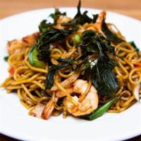 Asia Nine Lomein · Minced chicken, egg noodles, onions, mixed bell peppers, scallions, and fresh basil in a spi...