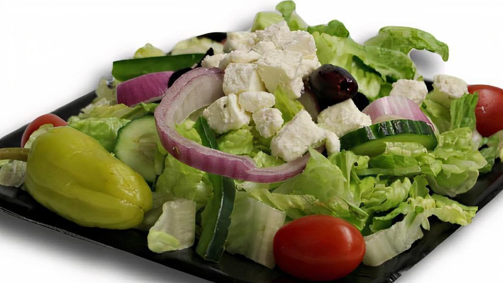 Greek Salad · Lettuce, romaine, tomatoes, black olives, red onion, feta cheese with our homemade Greek dressing.
