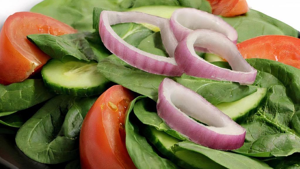 Spinach Salad · Spinach, red onion, cucumber, fresh tomato, & feta cheese.