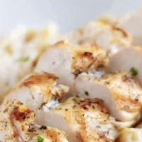 Chicken Alfredo · Fettuccine pasta smothering in our homemade Alfredo sauce, topped with seasoned grilled chic...