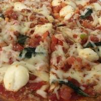 Margherita Pizza · Tomato, basil and fresh mozzarella.