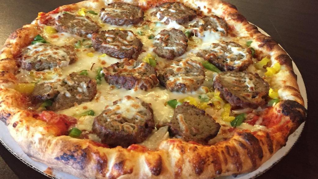 Italian Meatball Pizza · Tomato base, three cheese blend, Italian meatballs, green pepper, onion, and banana peppers