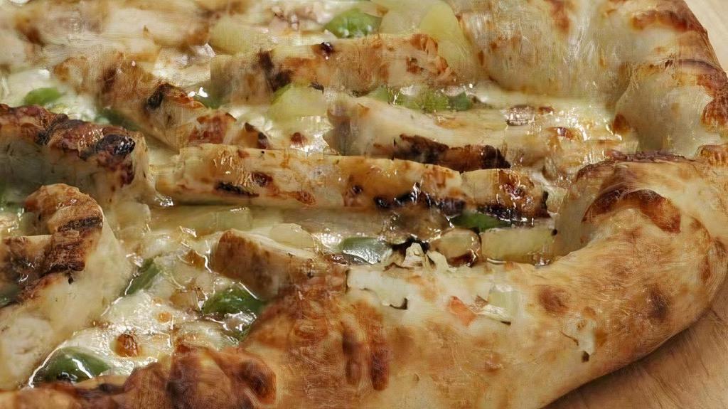Asian Teriyaki Pizza · Teriyaki sauce base, chicken, green peppers, pineapple, and red onion.