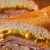 Cuban Sandwich · Ham, pulled pork, pickles & Swiss cheese