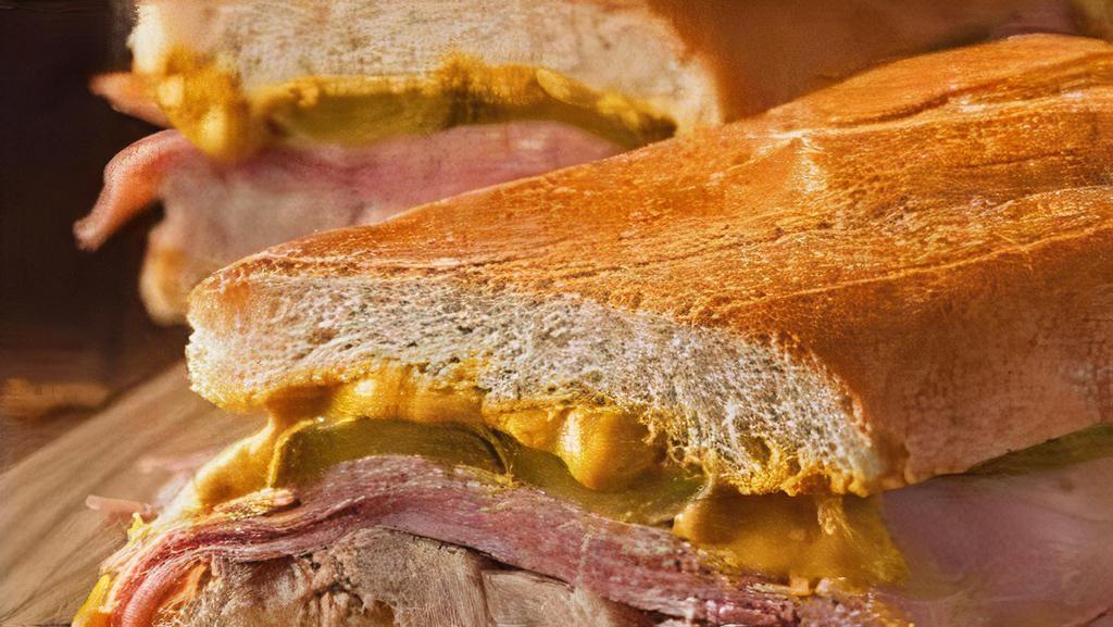 Cuban Sandwich · Ham, pulled pork, pickles & Swiss cheese
