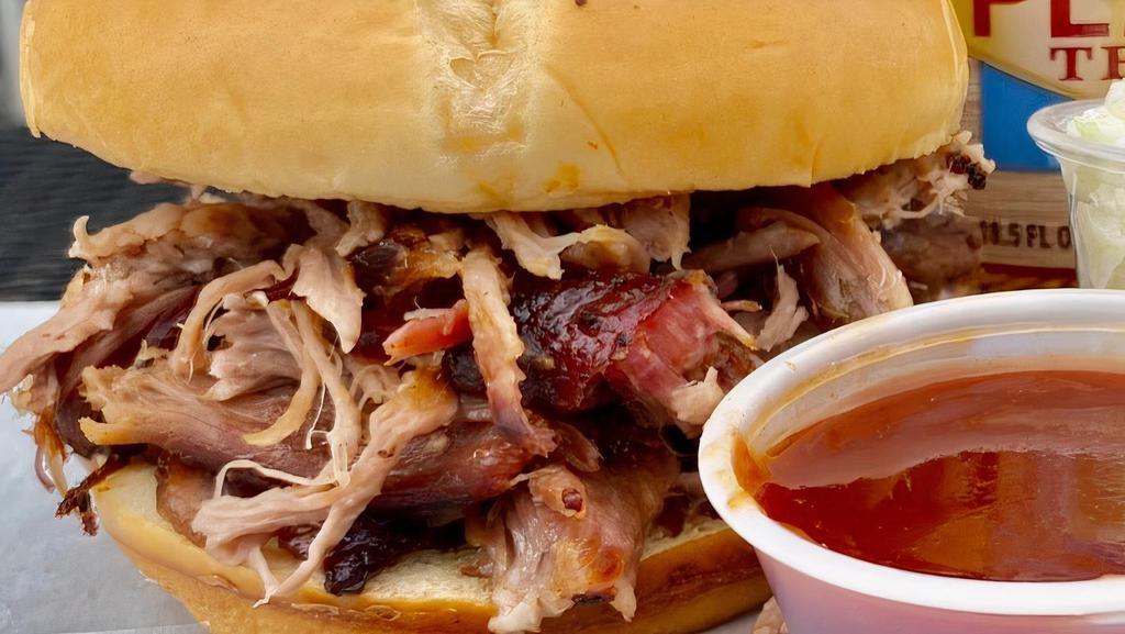 Family Pulled Pork With 2 Large Sides · Large platter with pulled bbq pork, buns & your choice of 2 large sides.