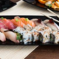 Sushi Plate (10)  · 10 nigiri, 1 roll, chef's choice of garnish