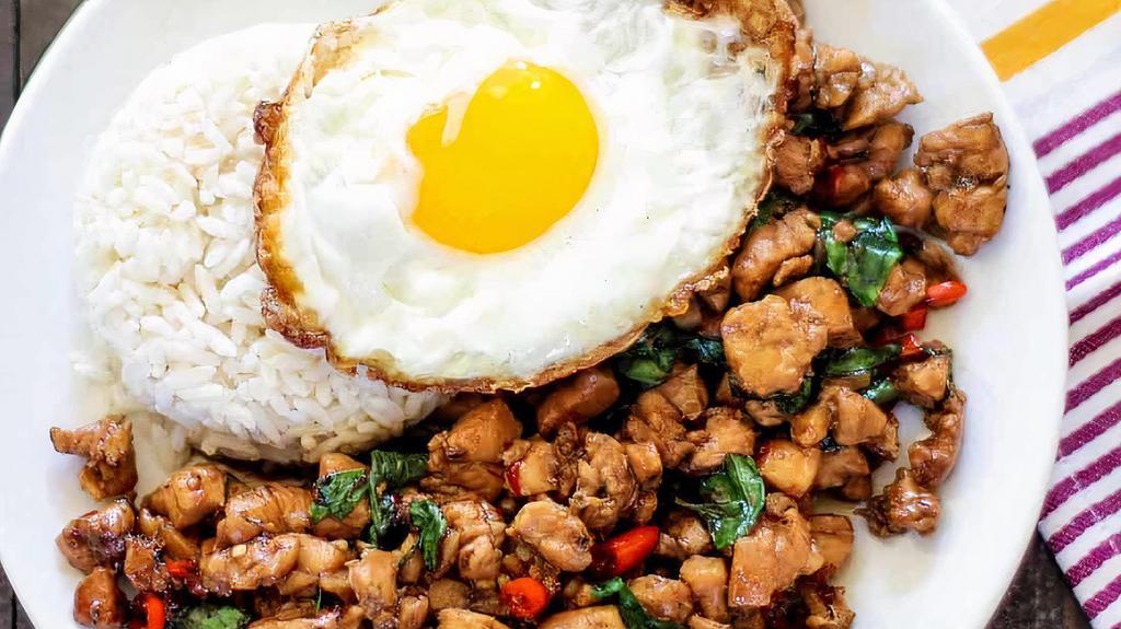 Pad Kha Phao · Spicy Ground Meat with Onion, Bell Peppers, Holy Basil, Topped with an Egg.
